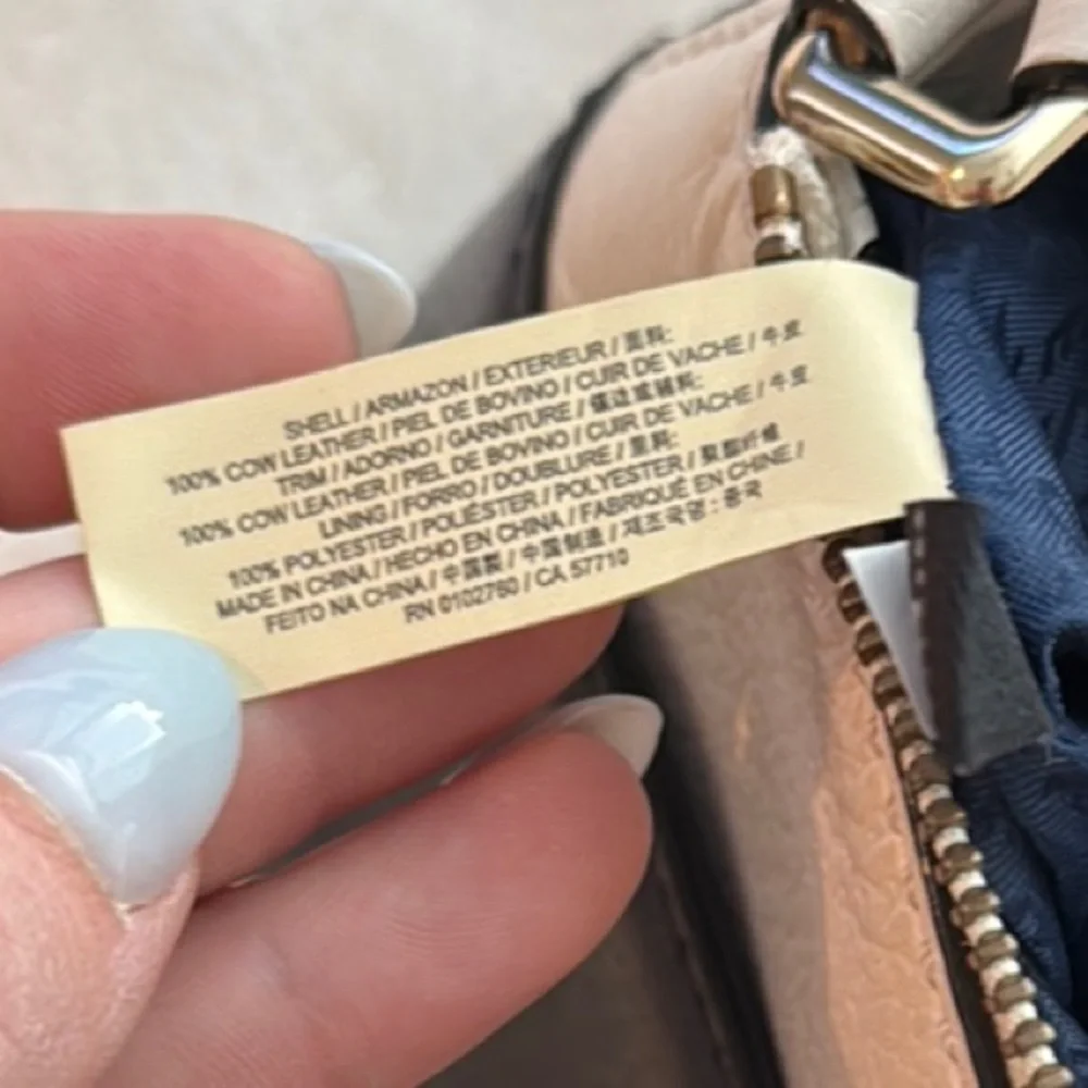 Kate Spade crossbody leather purse Navy and Cream small with exterior pocket